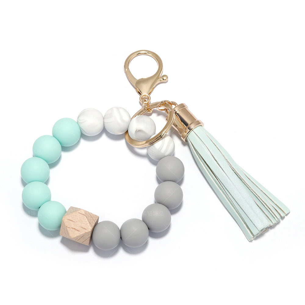 Venta al por mayor de silicona con cuentas de cuero PU borla pulsera pulsera